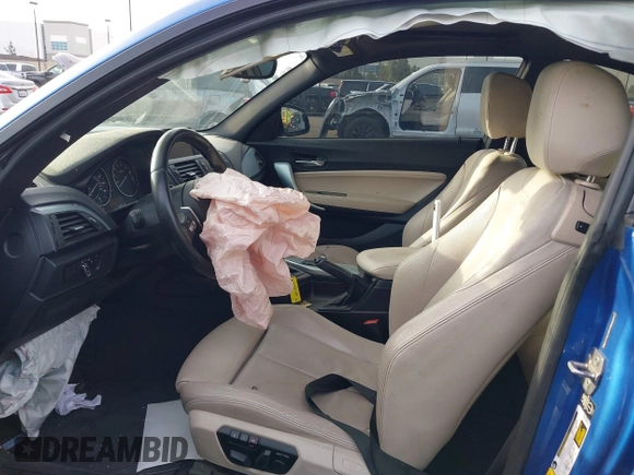 2015 BMW 2 Series 228i with VIN WBA1F5C59FVW98205, listed as a IAAI auction lot 41722804 with 91,879 mi miles. Bid and sale history available at carsss.com. Image 5.