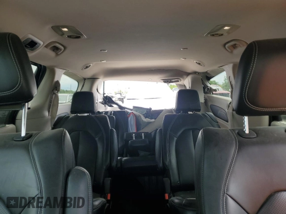 2023 Chrysler Pacifica Touring L with VIN 2C4RC1BG4PR621126, listed as a Copart auction lot 56694085 with 42,659 mi miles and Salvage title. Bid and sale history available at DreamBid. Image 10.