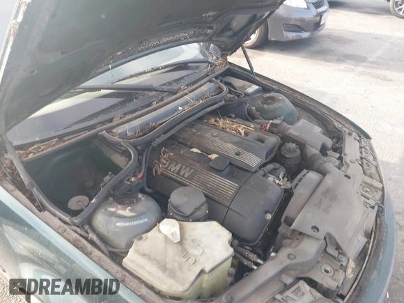 1999 BMW 3 Series 328i with VIN WBAAM5339XFR10536, listed as a IAAI auction lot 42242648 with 166,227 mi miles and . Bid and sale history available at DreamBid. Image 6.