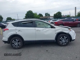 2018 Toyota RAV4 LE with VIN JTMBFREV6JJ210226, listed as a IAAI auction lot 42700312 with Not provided miles and . Bid and sale history available at DreamBid. Image 14.