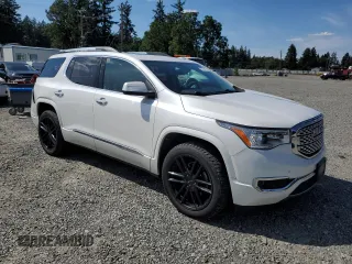 2017 GMC Acadia Denali with VIN 1GKKNXLS2HZ295257, listed as a Copart auction lot 57879415 with 76,953 mi miles and Salvage title. Bid and sale history available at DreamBid. Image 4.
