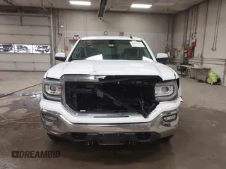 2016 GMC Sierra 1500 SLE z VIN 3GTU2MEC8GG187919, wystawiony jako IAAI lot #41967215 z przebiegiem 74 487 mil mil oraz . Historia ofert i sprzedaży dostępna na DreamBid. Obrazek 12.