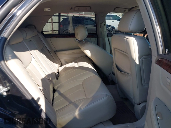 2006 Cadillac DTS w/1SC with VIN 1G6KD57Y26U156907, listed as a IAAI auction lot 42101639 with 188,886 mi miles. Bid and sale history available at carsss.com. Image 8.