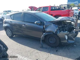 2015 Toyota Prius c One with VIN JTDKDTB33F1585004, listed as a IAAI auction lot 41950129 with 209,233 mi miles. Bid and sale history available at carsss.com. Image 13.