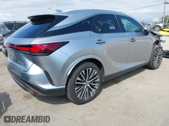 2024 Lexus RX with VIN 2T2BBMCA2RC059807, listed as a IAAI auction lot 41877717 with 3,284 mi miles. Bid and sale history available at carsss.com. Image 4.