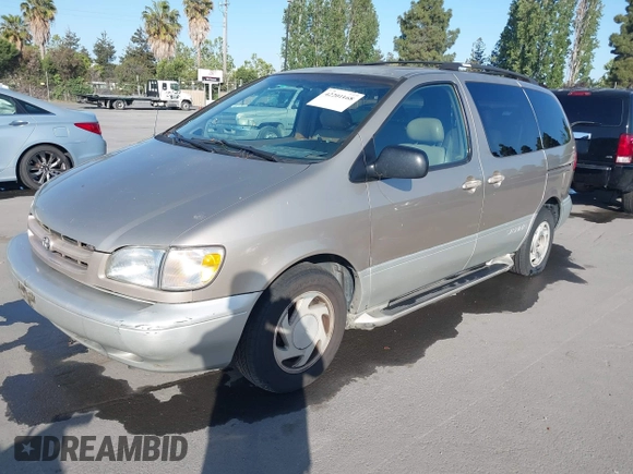 2000 Toyota Sienna LE with VIN 4T3ZF13C9YU189305, listed as a IAAI auction lot 42201168 with 218,254 mi miles and . Bid and sale history available at DreamBid. Image 2.