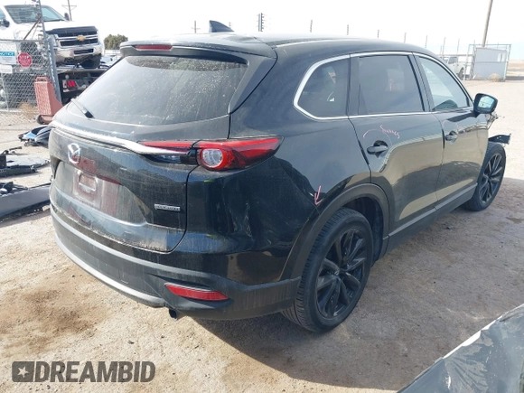 2023 Mazda CX-9 Touring Plus with VIN JM3TCBAY9P0649348, listed as a IAAI auction lot 41519499 with 23,749 mi miles and . Bid and sale history available at DreamBid. Image 4.