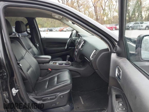 2013 Dodge Durango Crew with VIN 1C4RDHDG8DC592706, listed as a IAAI auction lot 40745114 with 95,757 mi miles and . Bid and sale history available at DreamBid. Image 5.