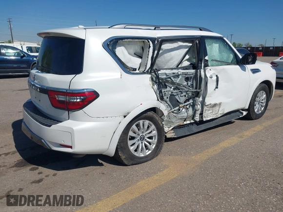 2023 Nissan Armada SV with VIN JN8AY2AD9P9692845, listed as a IAAI auction lot 42213250 with 59,880 mi miles and . Bid and sale history available at DreamBid. Image 4.