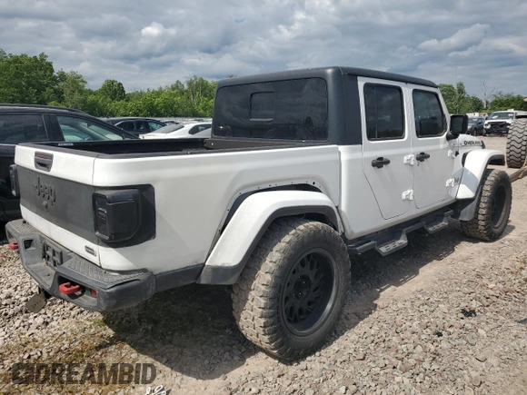 2020 Jeep Gladiator Overland z VIN 1C6HJTFG6LL135872, wystawiony jako Copart lot #59249895 z przebiegiem 113 519 mil mil oraz Czysty tytuł • Clean title. Historia ofert i sprzedaży dostępna na DreamBid. Obrazek 3.