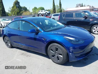 2023 Tesla Model 3 with VIN 5YJ3E1EA1PF431190, listed as a IAAI auction lot 41980007 with 26,164 mi miles and . Bid and sale history available at DreamBid. Image 13.