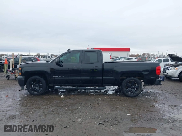 2015 Chevrolet Silverado 1500 LS with VIN 1GCRCPEH5FZ410299, listed as a IAAI auction lot 41106429 with 154,124 mi miles and . Bid and sale history available at DreamBid. Image 14.