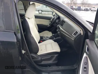 2016 Mazda CX-5 Grand Touring with VIN JM3KE4DY3G0769448, listed as a IAAI auction lot 41947725 with 154,051 mi miles and . Bid and sale history available at carsss.com. Image 5.