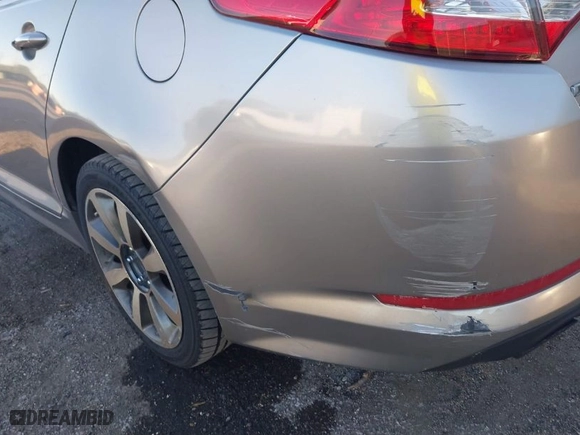 2013 Kia Optima SX w/Limited Pkg with VIN 5XXGR4A63DG124072, listed as a IAAI auction lot 40998791 with 144,696 mi miles. Bid and sale history available at carsss.com. Image 12.