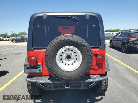 2004 Jeep Wrangler Sport with VIN 1J4FA49S24P720488, listed as a Copart auction lot 60331795 with 134,974 mi miles and Salvage title. Bid and sale history available at DreamBid. Image 6.