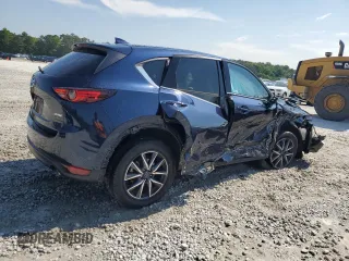 2018 Mazda CX-5 Grand Touring z VIN JM3KFADM5J1420690, wystawiony jako Copart lot #56897875 z przebiegiem 46 483 mil mil oraz Szkoda całkowita • Salvage title. Historia ofert i sprzedaży dostępna na DreamBid. Obrazek 3.