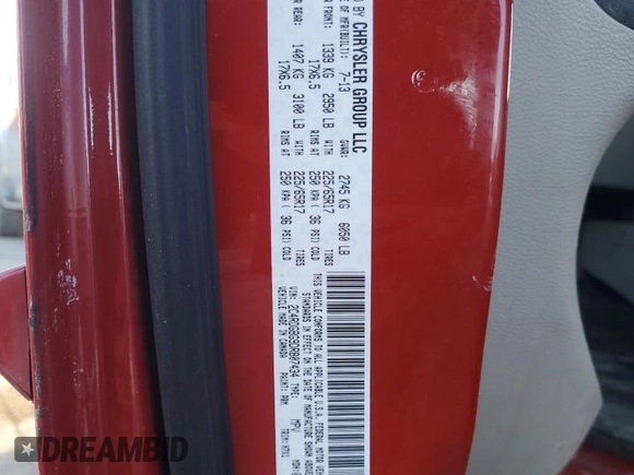2013 Dodge Grand Caravan SE with VIN 2C4RDGBG9DR807434, listed as a Copart auction lot 42413335 with 255,497 mi miles and Salvage Title. Bid and sale history available at DreamBid. Image 13.