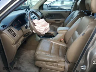 2006 Honda Pilot EX-L with VIN 5FNYF28586B048997, listed as a Copart auction lot 71120924 with 215,080 mi miles and Salvage Title. Bid and sale history available at carsss.com. Image 7.