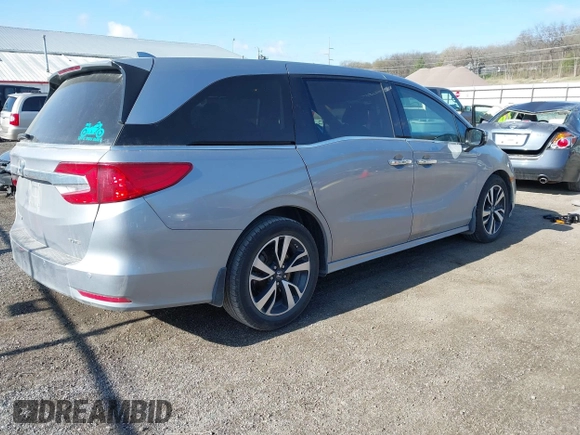 2018 Honda Odyssey Elite z VIN 5FNRL6H91JB070355, wystawiony jako IAAI lot #41975916 z przebiegiem 147 022 mil mil oraz . Historia ofert i sprzedaży dostępna na DreamBid. Obrazek 4.