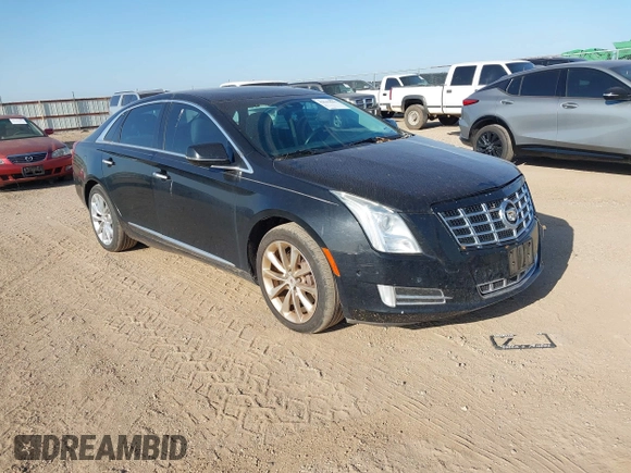 2014 Cadillac XTS Luxury with VIN 2G61M5S35E9228802, listed as a IAAI auction lot 42542501 with 106,506 mi miles and . Bid and sale history available at DreamBid. Image 1.