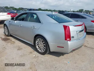 2012 Cadillac CTS Performance z VIN 1G6DJ5E37C0145221, wystawiony jako IAAI lot #42111935 z przebiegiem 82 103 mil mil oraz . Historia ofert i sprzedaży dostępna na DreamBid. Obrazek 3.