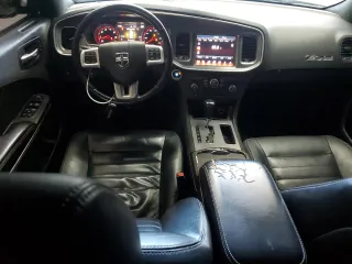2011 Dodge Charger RT Max with VIN 2B3CM5CT1BH551543, listed as a Copart auction lot 56913624 with 104,221 mi miles and Clean Title. Bid and sale history available at carsss.com. Image 8.