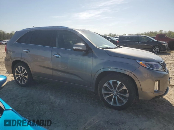 2015 Kia Sorento SX with VIN 5XYKW4A70FG638701, listed as a Copart auction lot 53567915 with 181,241 mi miles and Salvage title. Bid and sale history available at DreamBid. Image 4.