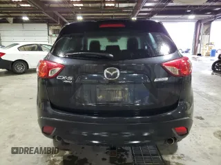 2013 Mazda CX-5 Touring with VIN JM3KE4CE8D0121607, listed as a Copart auction lot 56217965 with 143,861 mi miles and Clean Title. Bid and sale history available at DreamBid. Image 6.