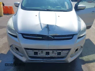 2013 Ford Escape SEL with VIN 1FMCU9H99DUA11243, listed as a IAAI auction lot 42356731 with 154,937 mi miles and . Bid and sale history available at DreamBid. Image 6.