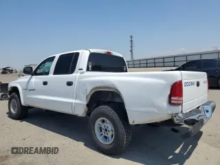 2000 Dodge Dakota Sport with VIN 1B7GG2AN8YS598547, listed as a Copart auction lot 54520985 with 244,605 mi miles and Salvage Title. Bid and sale history available at carsss.com. Image 2.