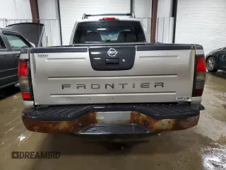 2004 Nissan Frontier XE z VIN 1N6ED29Y64C419454, wystawiony jako Copart lot #56629355 z przebiegiem 214 296 mil mil oraz Szkoda całkowita • Salvage title. Historia ofert i sprzedaży dostępna na DreamBid. Obrazek 6.