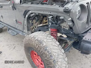 2021 Jeep Gladiator Rubicon with VIN 1C6JJTBG7ML554354, listed as a IAAI auction lot 41796943 with 61,513 mi miles and . Bid and sale history available at DreamBid. Image 6.
