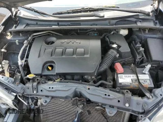 2014 Toyota Corolla L z VIN 2T1BURHE8EC190080, wystawiony jako Copart lot #60614225 z przebiegiem 194 254 mil mil oraz Szkoda całkowita • Salvage title. Historia ofert i sprzedaży dostępna na DreamBid. Obrazek 11.