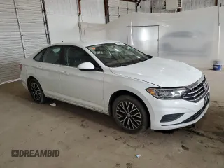2021 Volkswagen Jetta S z VIN 3VWC57BU4MM014328, wystawiony jako Copart lot #53358745 z przebiegiem 88 307 mil mil oraz Czysty tytuł • Clean title. Historia ofert i sprzedaży dostępna na DreamBid. Obrazek 4.
