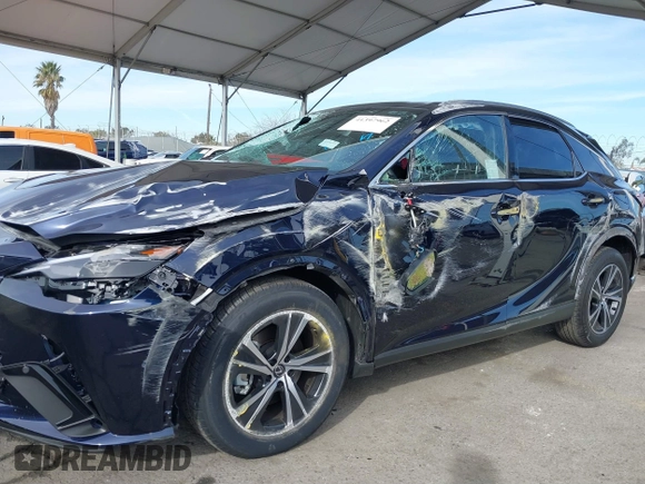 2025 Lexus RX with VIN JTJCHMAA2S2022218, listed as a IAAI auction lot 41397962 with 1,185 mi miles. Bid and sale history available at carsss.com. Image 6.