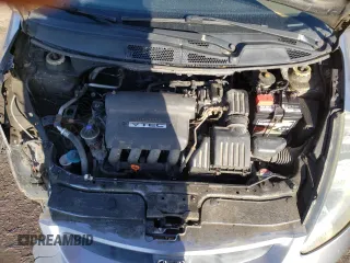 2008 Honda Fit z VIN JHMGD38458S812677, wystawiony jako Copart lot #52879675 z przebiegiem 150 814 mil mil oraz Szkoda całkowita • Salvage title. Historia ofert i sprzedaży dostępna na DreamBid. Obrazek 11.