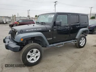 2013 Jeep Wrangler Unlimited Rubicon with VIN 1C4BJWFG2DL670733, listed as a Copart auction lot 58994575 with 96,185 mi miles and Salvage title. Bid and sale history available at DreamBid. Image 1.