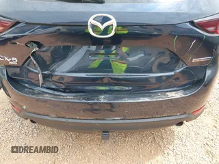 2020 Mazda CX-5 Touring with VIN JM3KFBCM9L0741535, listed as a IAAI auction lot 42101763 with 54,004 mi miles and . Bid and sale history available at DreamBid. Image 6.
