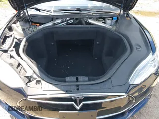 2013 Tesla Model S with VIN 5YJSA1CN0DFP21851, listed as a IAAI auction lot 42557791 with 106,328 mi miles and . Bid and sale history available at DreamBid. Image 10.