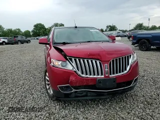 2011 Lincoln MKX z VIN 2LMDJ8JK1BBJ11607, wystawiony jako Copart lot #57126765 z przebiegiem 75 940 mil mil oraz Szkoda całkowita • Salvage title. Historia ofert i sprzedaży dostępna na DreamBid. Obrazek 14.
