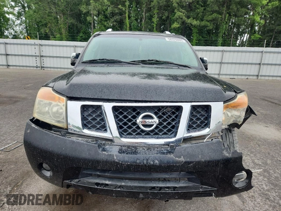 2010 Nissan Armada Titanium z VIN 5N1BA0ND0AN619506, wystawiony jako Copart lot #58329005 z przebiegiem 212 496 mil mil oraz Szkoda całkowita • Salvage title. Historia ofert i sprzedaży dostępna na DreamBid. Obrazek 5.