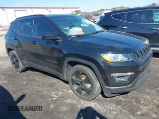 2021 Jeep Compass Altitude with VIN 3C4NJCBB4MT604761, listed as a IAAI auction lot 41643245 with 63,647 mi miles. Bid and sale history available at carsss.com. Image 1.