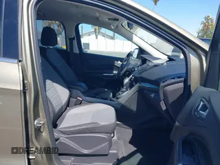 2013 Ford Escape SE with VIN 1FMCU0G99DUC05901, listed as a IAAI auction lot 42194672 with 121,435 mi miles and . Bid and sale history available at DreamBid. Image 5.