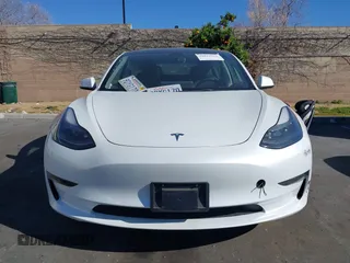 2023 Tesla Model 3 with VIN 5YJ3E1EA6PF411940, listed as a IAAI auction lot 41829537 with 32,877 mi miles and . Bid and sale history available at carsss.com. Image 11.