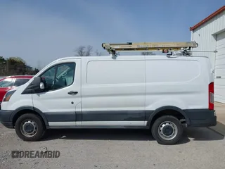 2016 Ford Transit Cargo z VIN 1FTYR1YM1GKB55452, wystawiony jako IAAI lot #41850416 z przebiegiem 91 973 mil mil oraz . Historia ofert i sprzedaży dostępna na DreamBid. Obrazek 14.