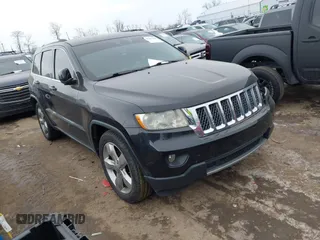 2013 Jeep Grand Cherokee Overland with VIN 1C4RJFCG1DC593890, listed as a IAAI auction lot 41264434 with 204,324 mi miles. Bid and sale history available at carsss.com. Image 1.