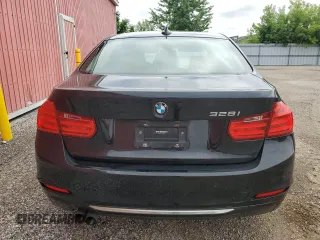 2012 BMW 3 Series 328i with VIN WBA3A5C57CF345040, listed as a Copart auction lot 63761735 with 106,665 mi miles and Clean title. Bid and sale history available at DreamBid. Image 6.