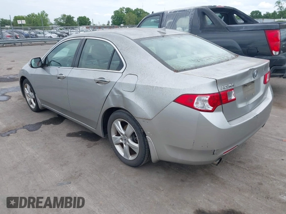 2010 Acura TSX with VIN JH4CU2F60AC019462, listed as a IAAI auction lot 42109261 with 112,131 mi miles. Bid and sale history available at carsss.com. Image 3.