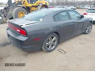 2014 Dodge Charger SXT Plus with VIN 2C3CDXJG0EH230635, listed as a IAAI auction lot 41890555 with 203,869 mi miles. Bid and sale history available at carsss.com. Image 4.