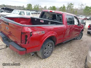2015 Ford F-150 XLT w/HD Payload Pkg with VIN 1FTFW1EF2FFB68885, listed as a IAAI auction lot 41411899 with 152,039 mi miles. Bid and sale history available at carsss.com. Image 4.
